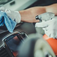 Image of someone cleaning their car using the top 11 car cleaning hacks